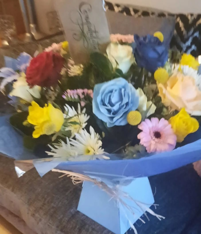 Bright Skies Bouquet - Bright Skies Bouquet – A colourful mixed flower bouquet with blue roses, yellow blooms and seasonal flowers. Fresh, vibrant and perfect for any occasion.