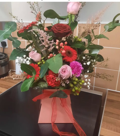 Romantic Garden - Romantic Garden – A red and pink rose flower bouquet with seasonal blooms, foliage and berries. Hand-tied and ideal for romance or special occasions.