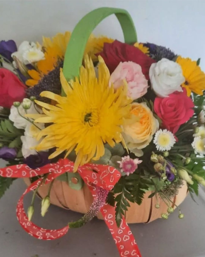 Sunny Basket - Sunny Basket – A colourful flower basket with yellow gerberas, roses and seasonal flowers. Bright, cheerful and perfect for any occasion.