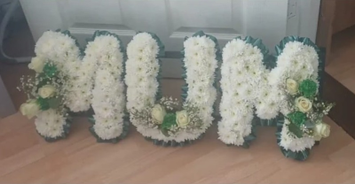 White funeral  Lettering available in Yeading UB4 - A beautiful floral tribute featuring fresh white chrysanthemum basing, finished with matching ribbon edging and delicate floral corsages.